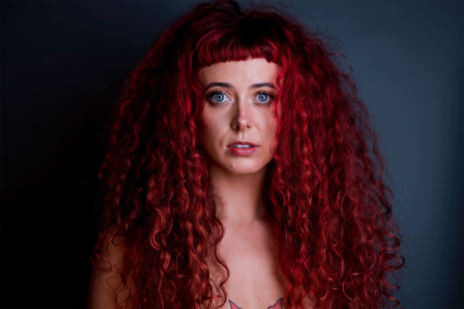 Studio portrait of Emily Lamey looking directly at the camera.