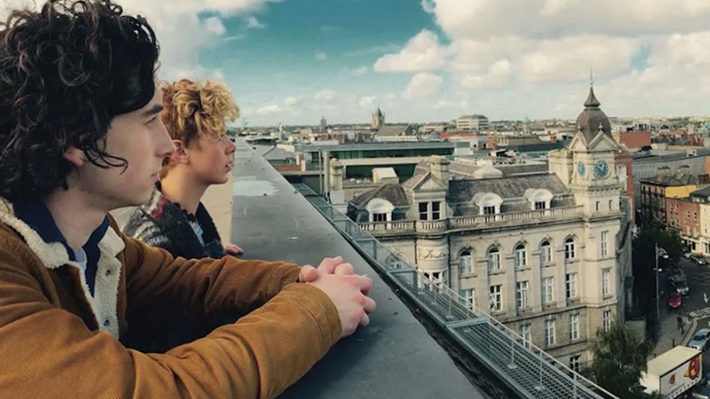 Emily Lamey and a scene partner on a Dublin rooftop in South.